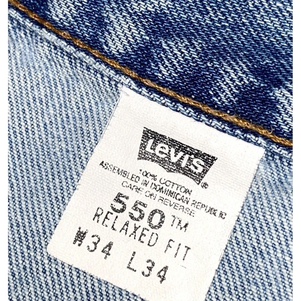 Vintage Levi's 550 Relaxed Fit Jeans Men's Size 34x34 (Fits 32x34) Blue Distress